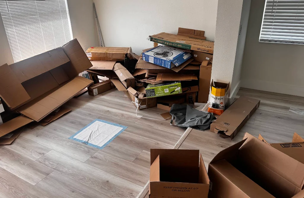 Move-out cleanout with cardboard ready for removal